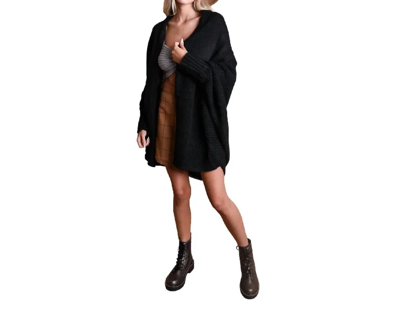 Carrie Ann Bat Sleeve Knit Cardigan In Black Solid Color Striped Floral Print